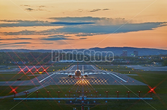 plane leaving at dusk