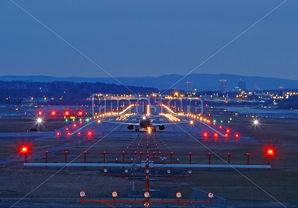 Airport Runway At Dusk