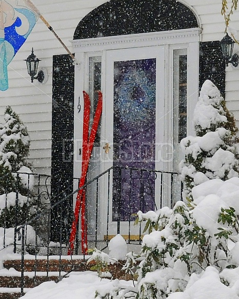 Red skis against front door